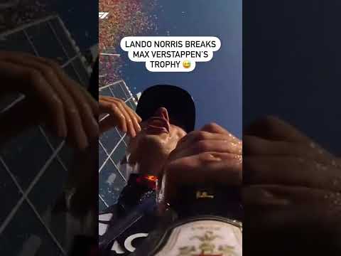 Lando Norris broke Max Verstappen’s trophy while doing his signature champagne opening 😅